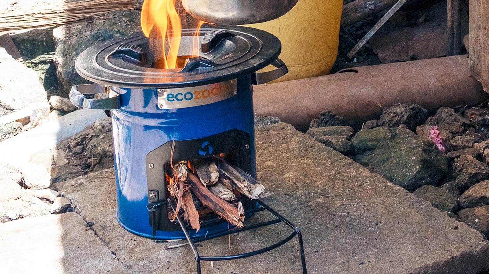 This portable wood burning stove cooks food and boils water